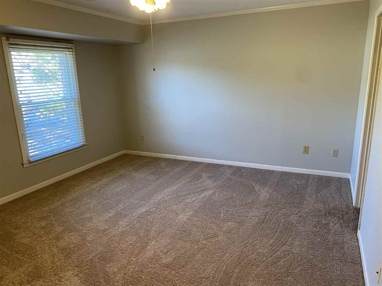 198 South Walnut Bend Road Memphis, TN 38018 - Photo 8 of 18 an empty room with windows
