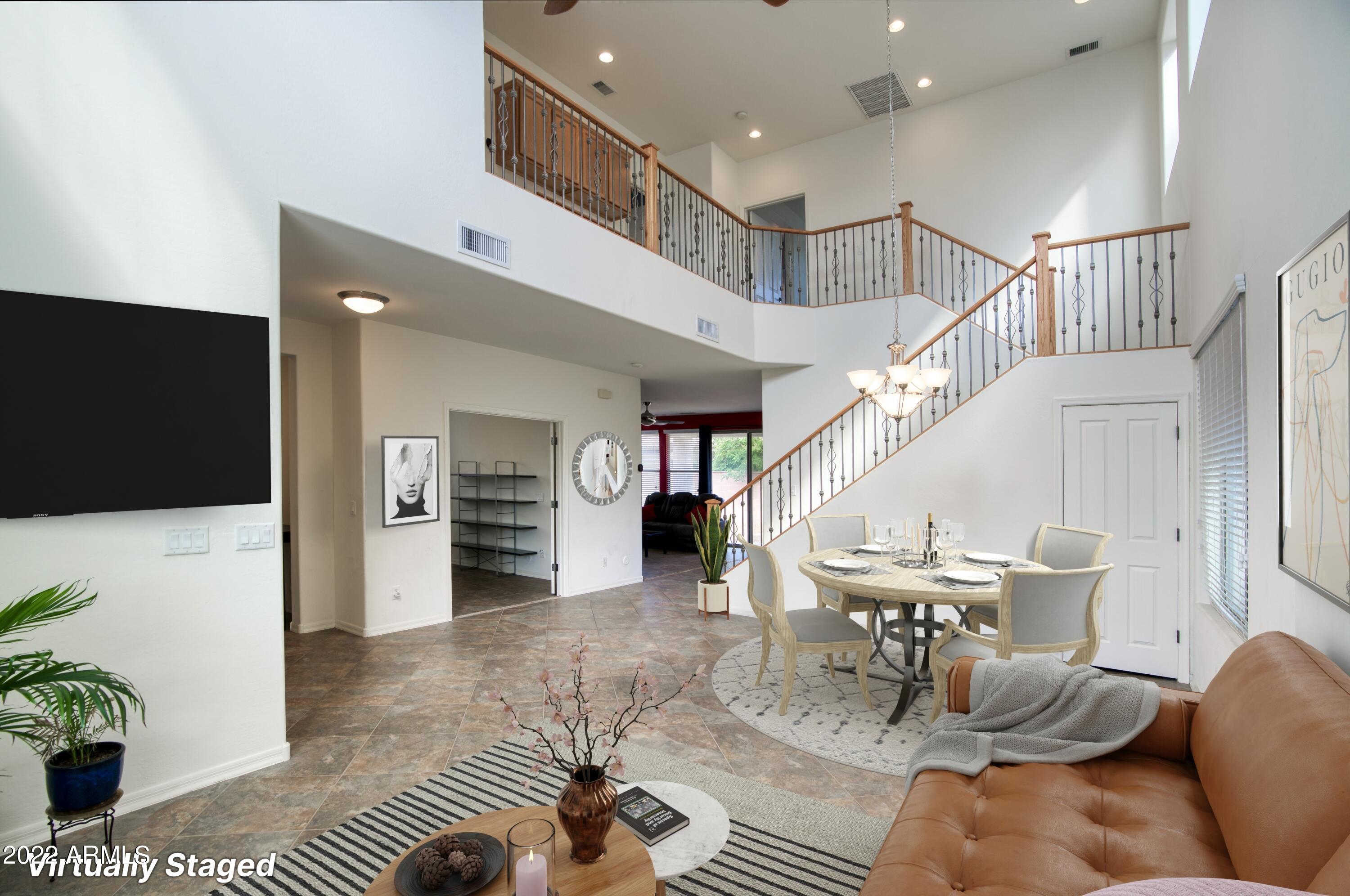 3412 West Florimond Road Phoenix, AZ 85086 - Photo 2 of 34 Virtually Staged Living Room Area