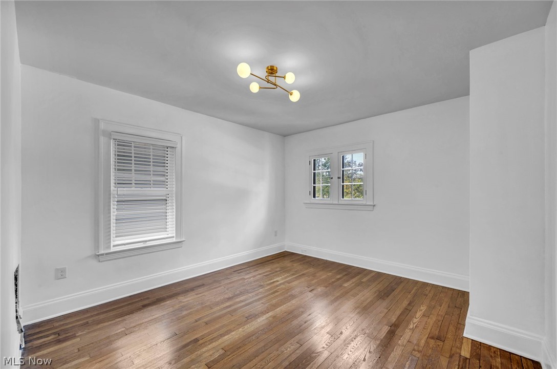 2135 Coventry Road, Unit DOWN Cleveland, OH 44118 - Photo 29 of 34 Spare room with dark wood finished floors and baseboards