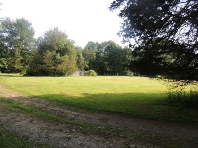4 Cedar Pond Road Westport, CT 06880 - Photo 1 of 1 a view of an outdoor space and a yard
