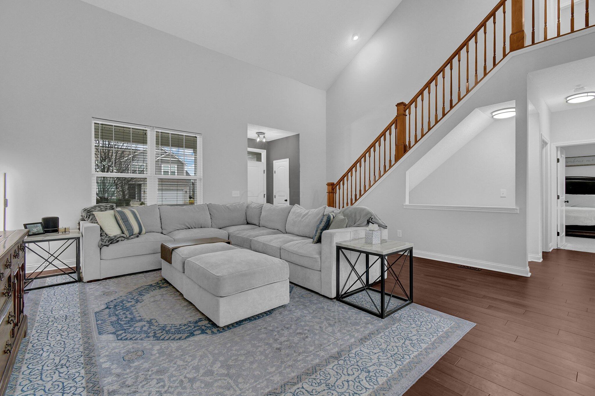 916 Rooks Circle Sunbury, OH 43074 - Photo 1 of 39 Vaulted entry is TRULY beautiful! Freshly painted great room is light and airy. Engineered hardwood flooring, upgraded ceiling fan, and open to the kitchen make this a wonderful place to entertain!
