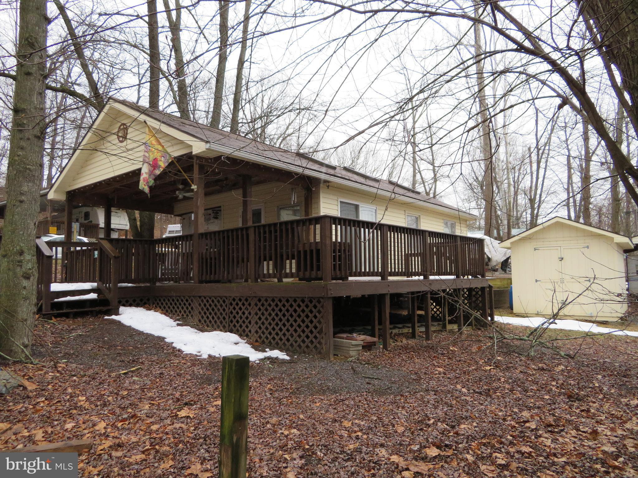Detour Road Falling Waters, WV 25419 - Photo 1 of 29 Covered front deck & side deck