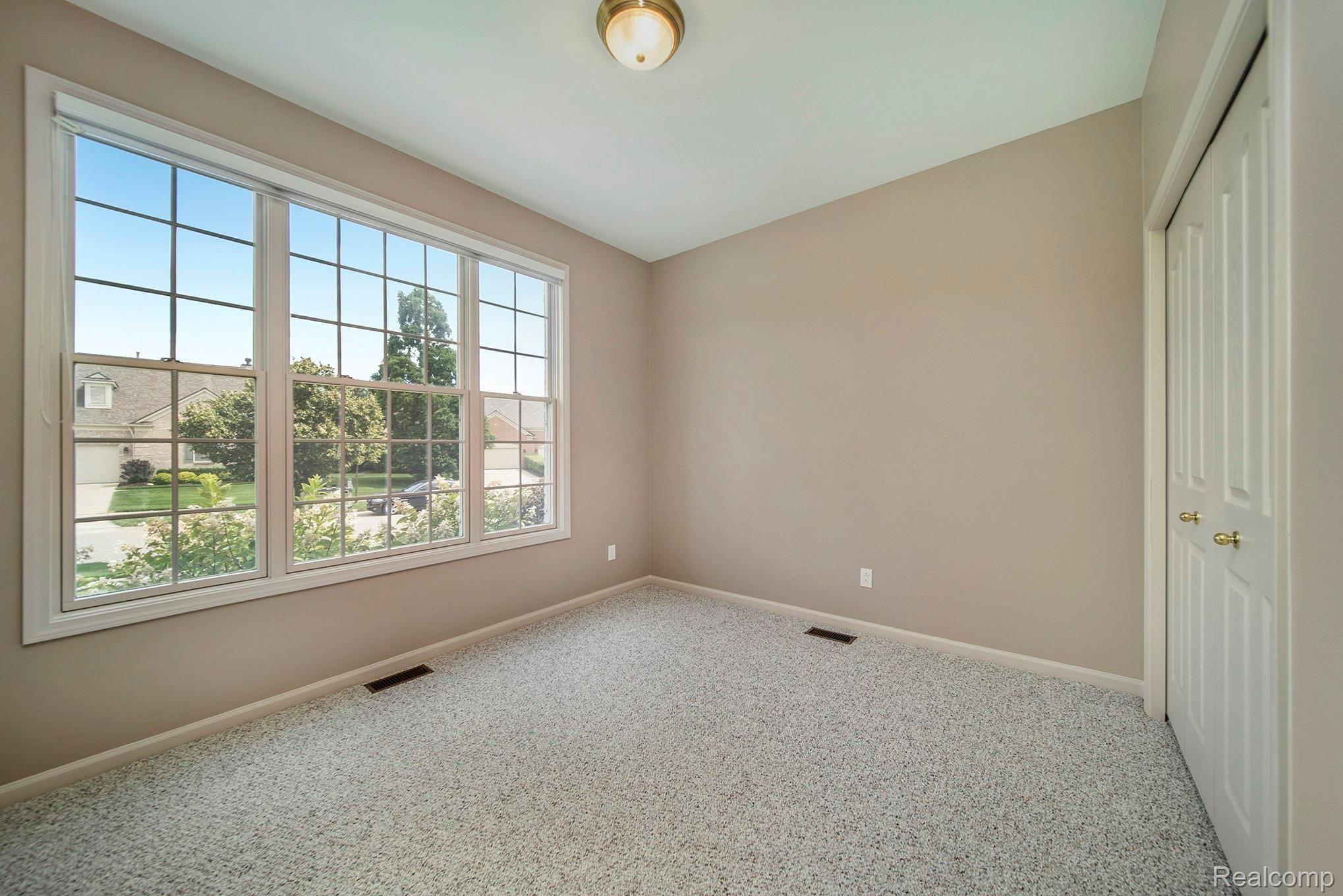 1379 Copper Circle, Unit 35 Rochester, MI 48306 - Photo 29 of 47 BEDROOM 2 - NEWER CARPET