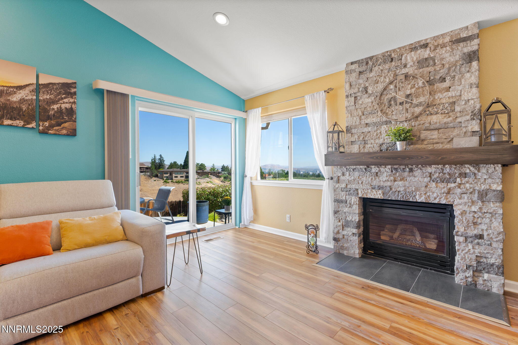 2255 Wide Horizon Drive Reno, NV 89509 - Photo 11 of 52 a living room with furniture and a fireplace