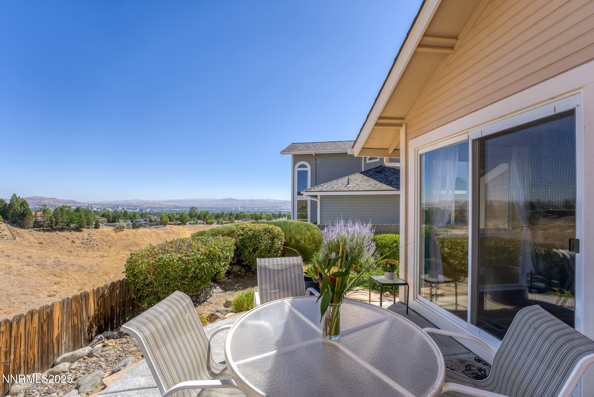2255 Wide Horizon Drive Reno, NV 89509 - Photo 29 of 52 a view of a balcony with chair and a potted plant