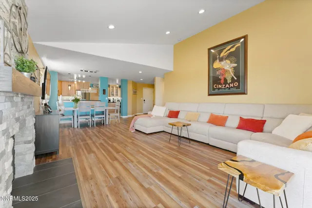 a living room with furniture and a table