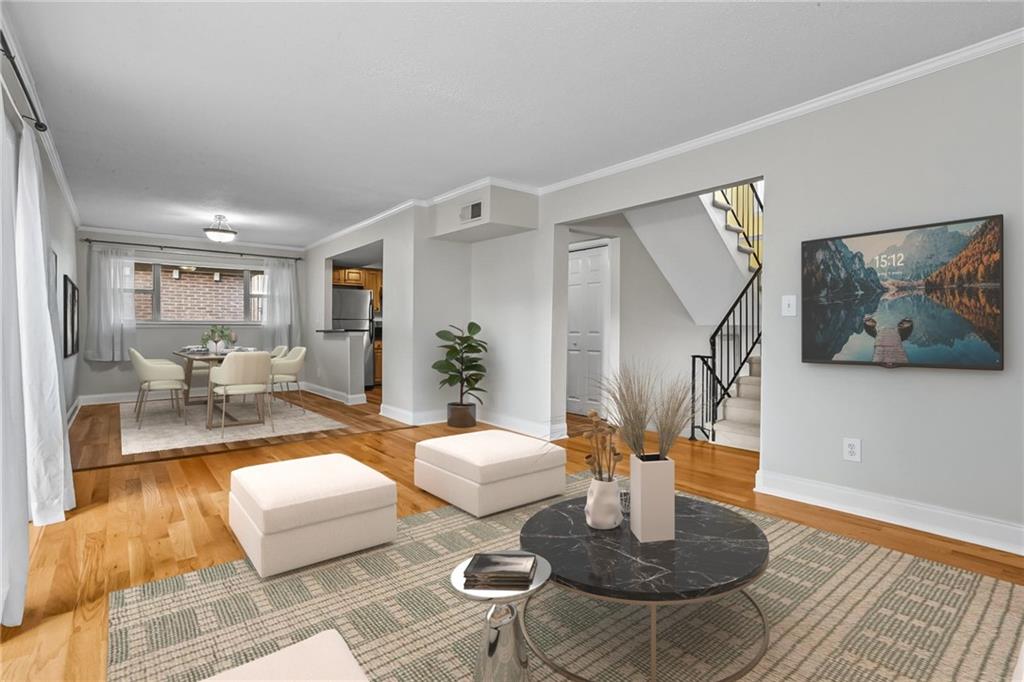 3301 Henderson Mill Road, Unit L4 Atlanta, GA 30341 - Photo 4 of 33 a living room with fireplace furniture and a rug