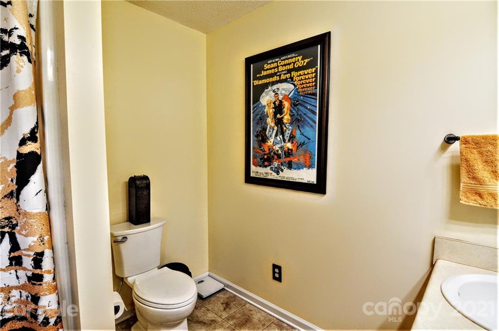 3874 Redman Road Shelby, NC 28150 - Photo 22 of 47 a bathroom with a toilet and a shower