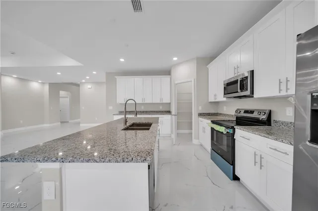 $2,600 | 543 McArthur Boulevard, Lehigh Acres, FL 33974