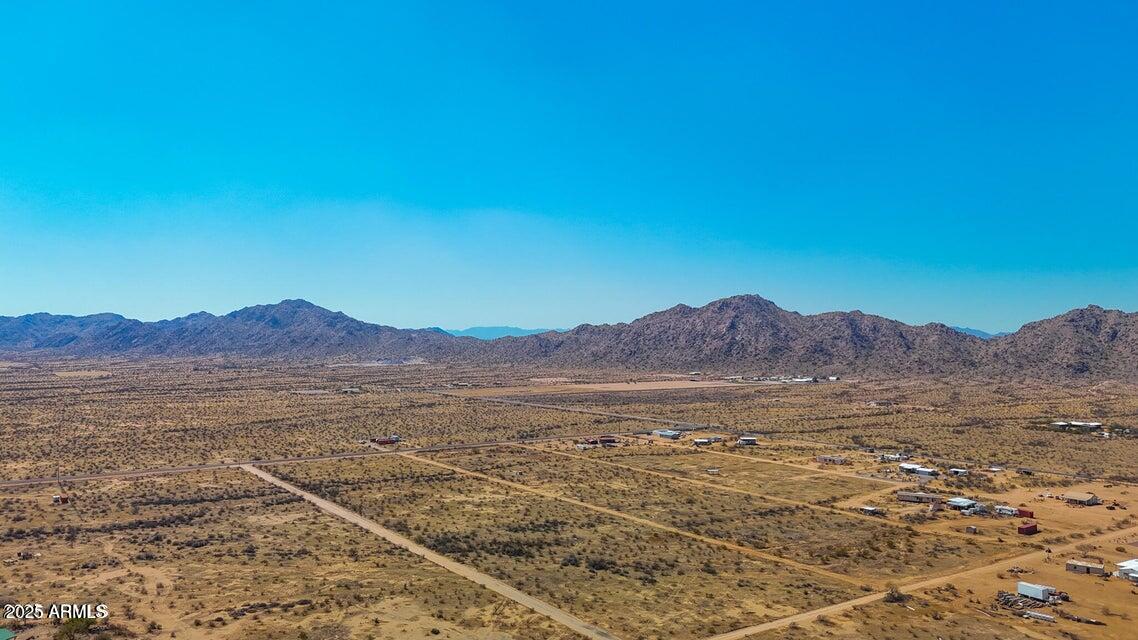 20245 North Undetermined Road Maricopa, AZ 85139 - Photo 11 of 20 a view of a house with a mountain