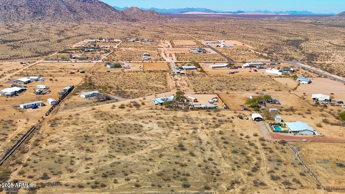 20245 North Undetermined Road Maricopa, AZ 85139 - Photo 15 of 20 an aerial view of residential houses with outdoor space