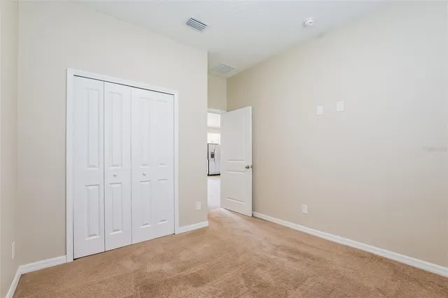 an empty room with an entryway