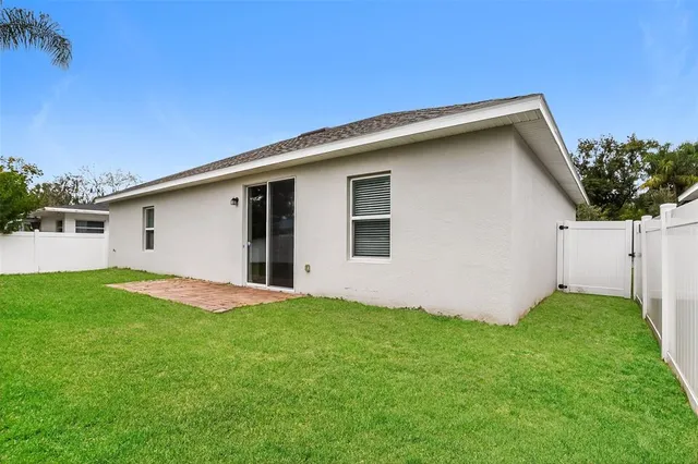 a view of backyard with backyard