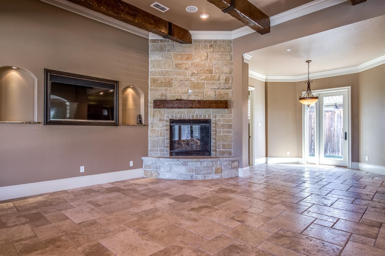 3810 109th Street Lubbock, TX 79423 - Photo 7 of 10 Austin stone fireplace in family room