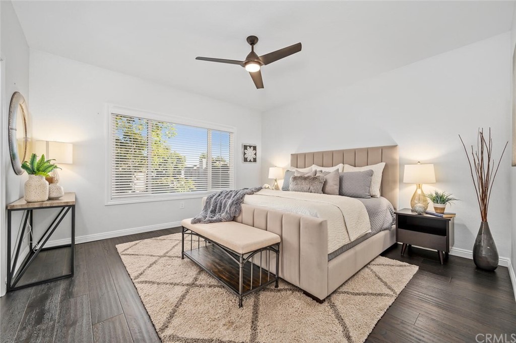 4350 Milano Way Oceanside, CA 92057 - Photo 14 of 30 a bedroom with a bed and a window