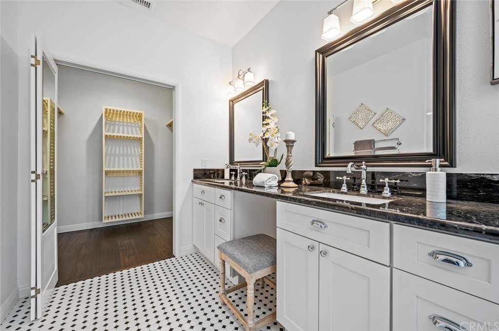 4350 Milano Way Oceanside, CA 92057 - Photo 17 of 30 a kitchen with a sink and cabinets