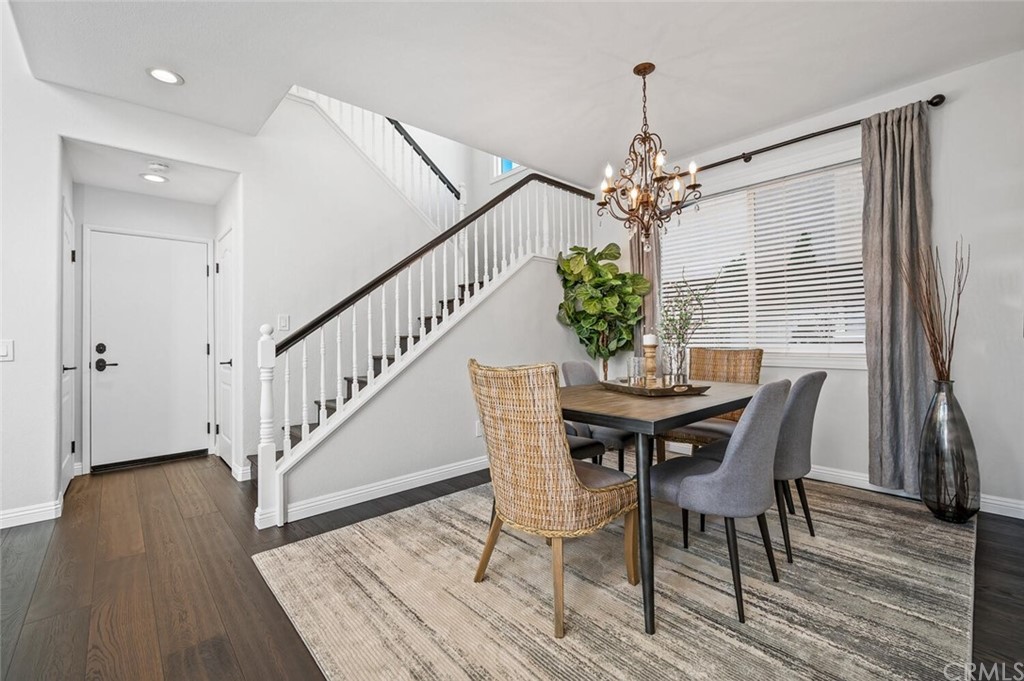 4350 Milano Way Oceanside, CA 92057 - Photo 6 of 30 a view of a dining room with furniture window and wooden floor