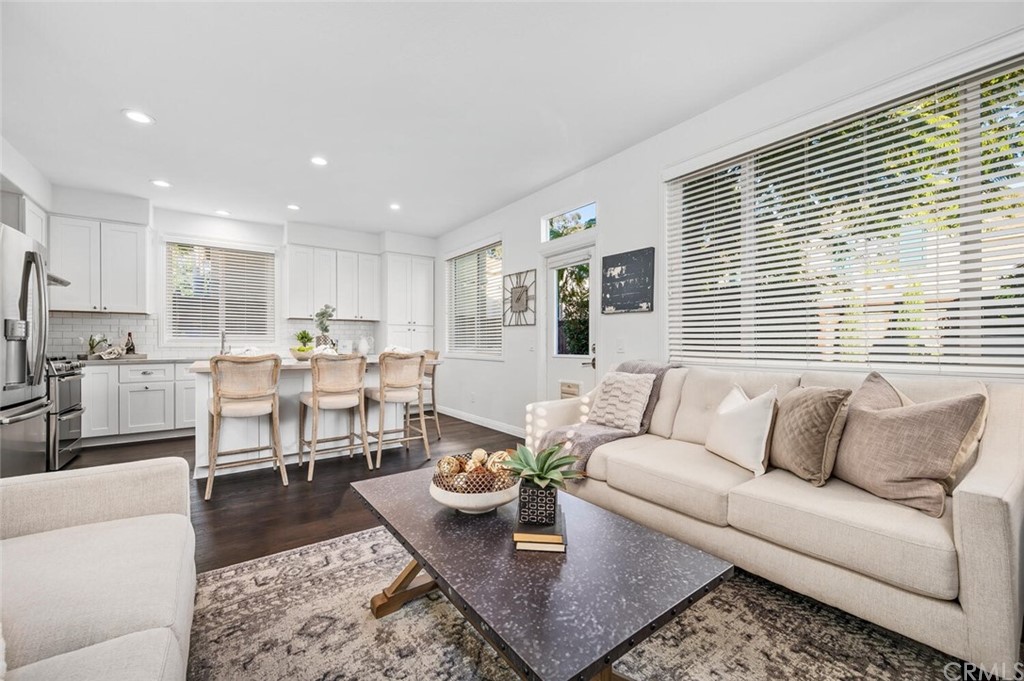4350 Milano Way Oceanside, CA 92057 - Photo 7 of 30 a living room with furniture wooden floor and a table