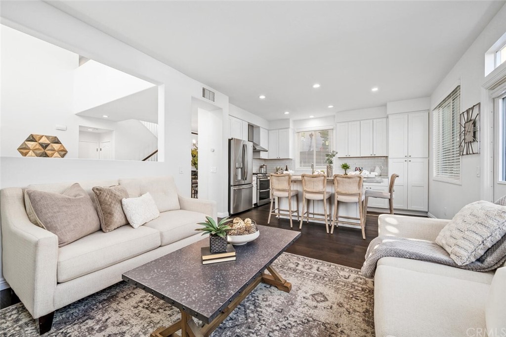 4350 Milano Way Oceanside, CA 92057 - Photo 8 of 30 a living room with furniture kitchen view and a table