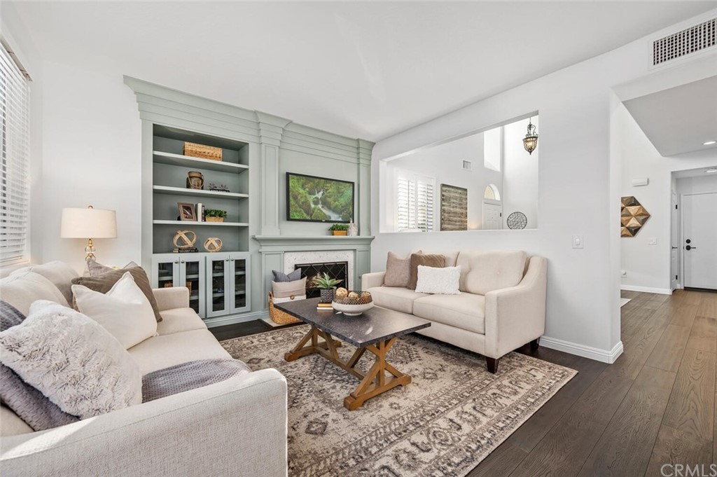 4350 Milano Way Oceanside, CA 92057 - Photo 9 of 30 a living room with furniture and a fireplace