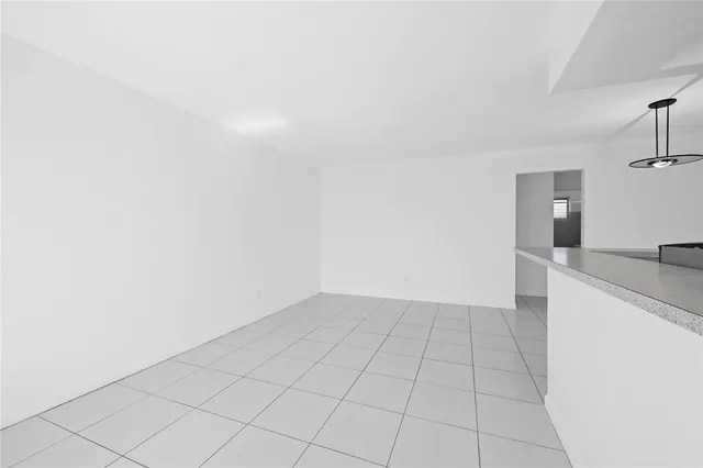 a view of a kitchen with a sink