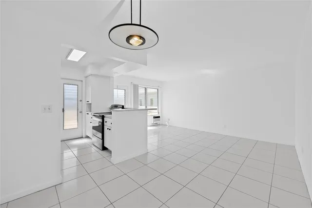 a view of kitchen with windows