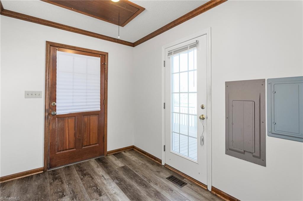 7021 Eaglesfield Road Gibsonville, NC 27249 - Photo 20 of 49 Spacious mudroom featuring a convenient drop zone for personal items as you come in from the garage.