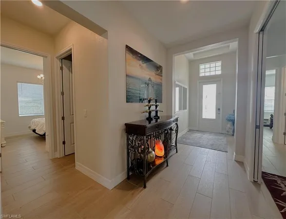 wooden floor in a livingroom and a livingroom with furniture