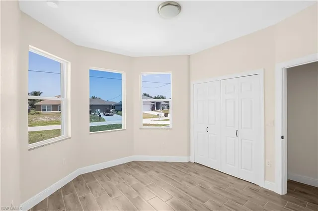 an empty room with windows