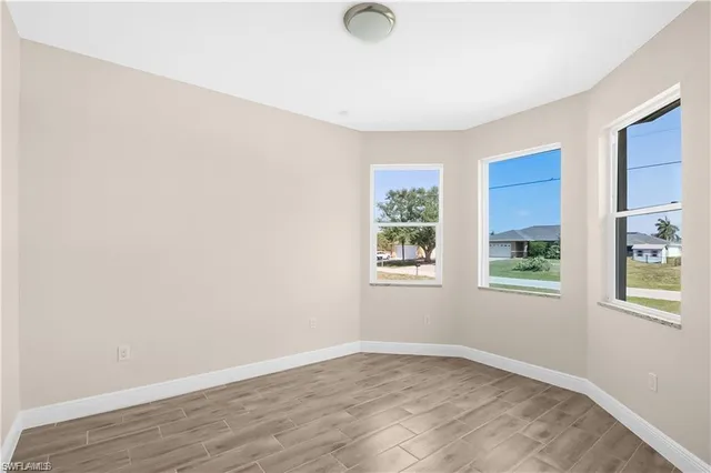 an empty room with windows