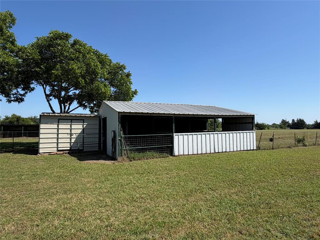 330 South Goode Road Wilmer, TX 75172 - Photo 38 of 38 a view of a house with a yard