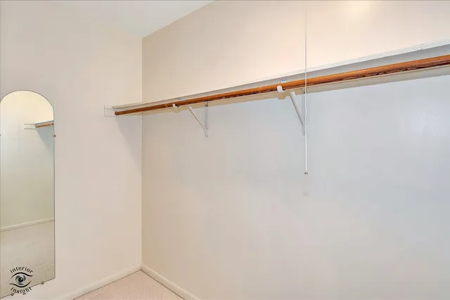 a view of a room with racks on the wall