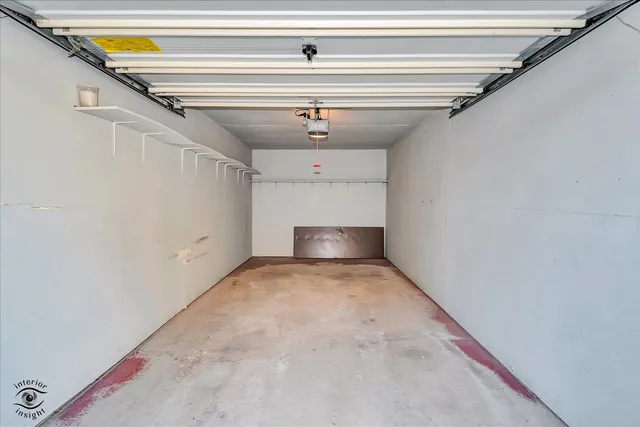 a view of a hallway with a white walls