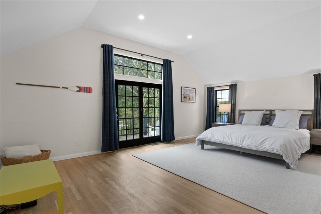 101 A Monomoyic Way Chatham, MA 02633 - Photo 20 of 42 a spacious bedroom with a bed and a window