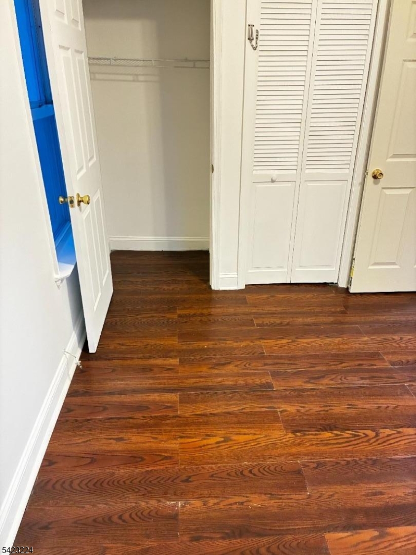 73 Wolcott Terrace Newark, NJ 07112 - Photo 18 of 20 a view of front door with wooden floor
