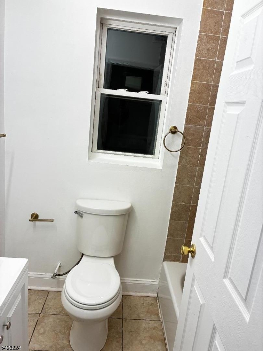 73 Wolcott Terrace Newark, NJ 07112 - Photo 19 of 20 a bathroom with a toilet and a sink