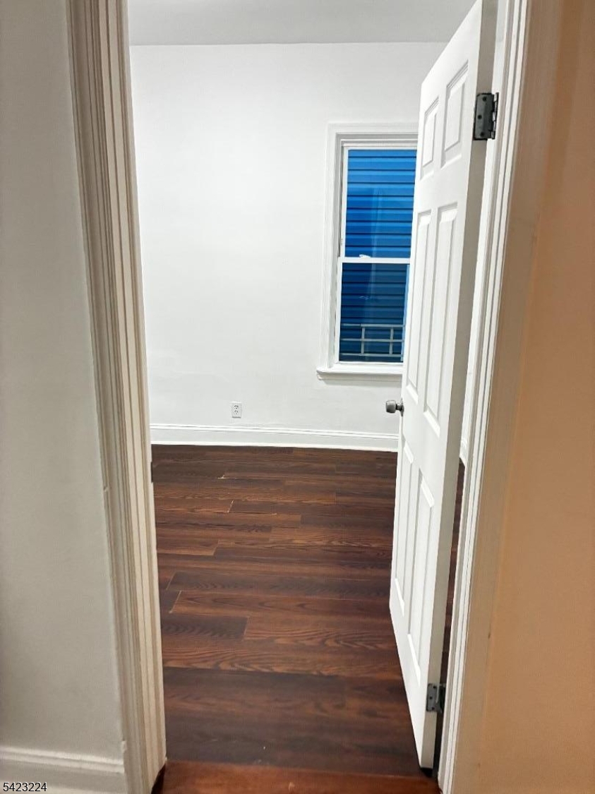 73 Wolcott Terrace Newark, NJ 07112 - Photo 10 of 20 a view of front door with wooden floor