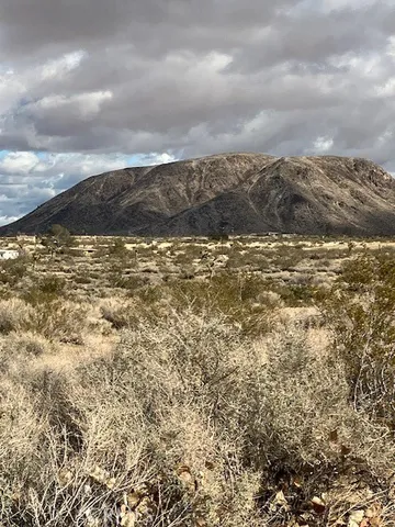 a view of ocean and mountain