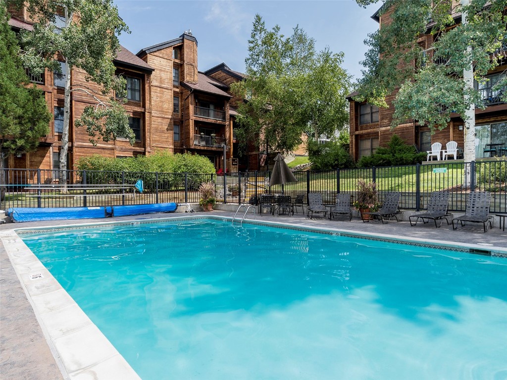 2025 Walton Creek Road, Unit 315 Steamboat Springs, CO 80487 - Photo 2 of 37 Relax poolside in summer and soak in the hot tub in winter after a day of fun.