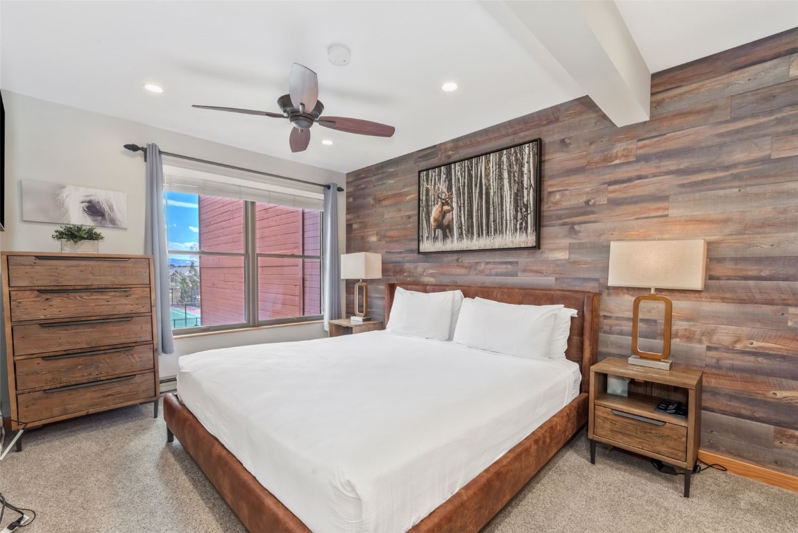 2025 Walton Creek Road, Unit 315 Steamboat Springs, CO 80487 - Photo 25 of 37 Primary bedroom with private bath.