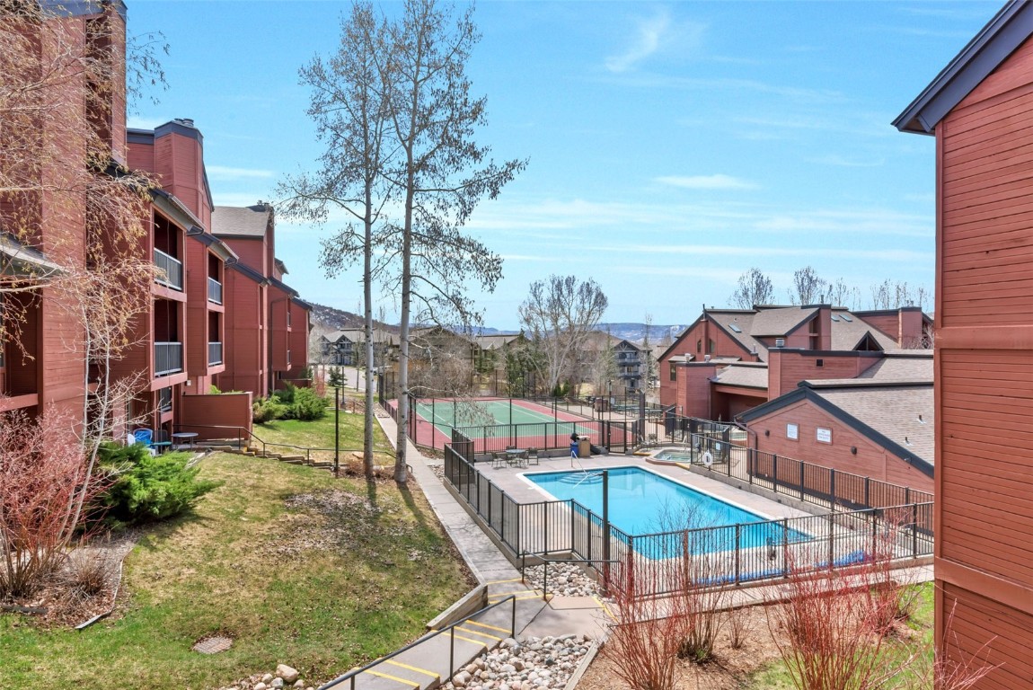 2025 Walton Creek Road, Unit 315 Steamboat Springs, CO 80487 - Photo 8 of 37 Fun in the pool, hot tubs or on the tennis court or grilling in the afternoon.