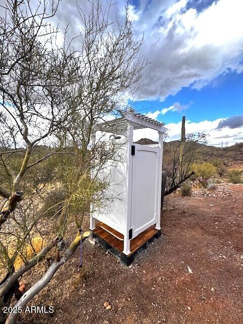 0 Elephant Butte Road Gold Canyon, AZ 85118 - Photo 13 of 15 a view of a field with roof and a tree