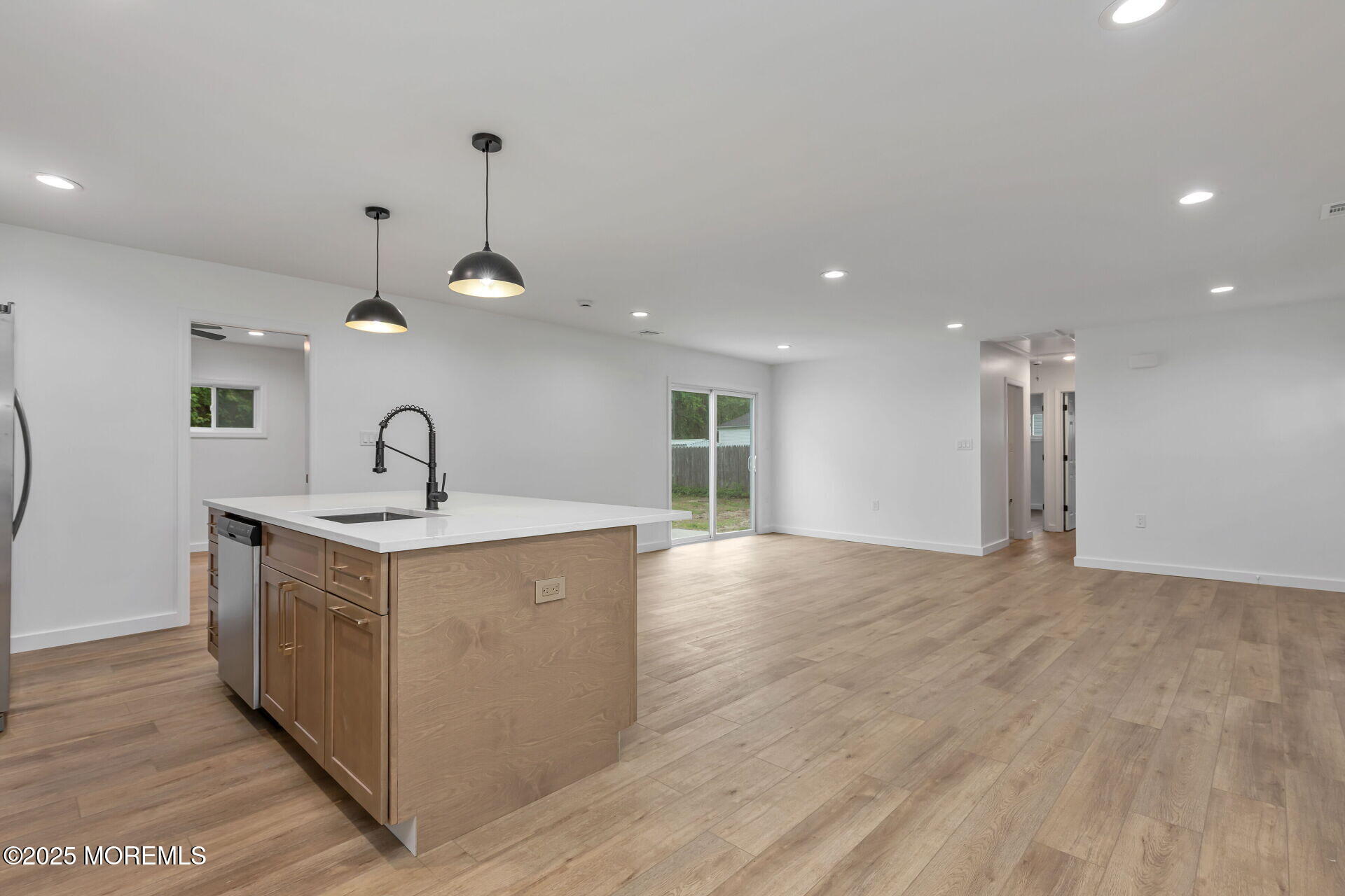 138 Stephan Road Brick, NJ 08724 - Photo 16 of 38 a view of a kitchen with a sink and a stove top oven