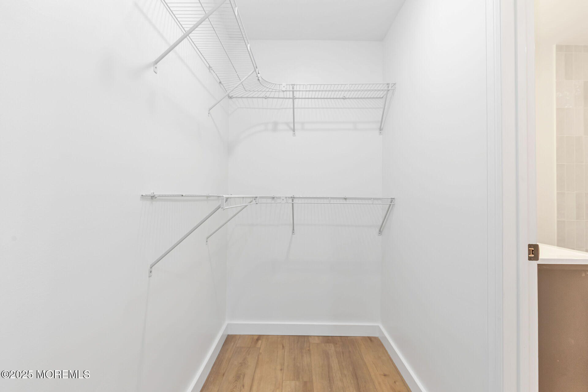 138 Stephan Road Brick, NJ 08724 - Photo 19 of 38 a view of a room with racks on the wall