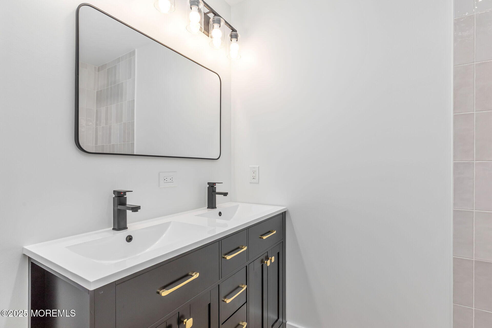 138 Stephan Road Brick, NJ 08724 - Photo 21 of 38 a bathroom with a sink and a mirror