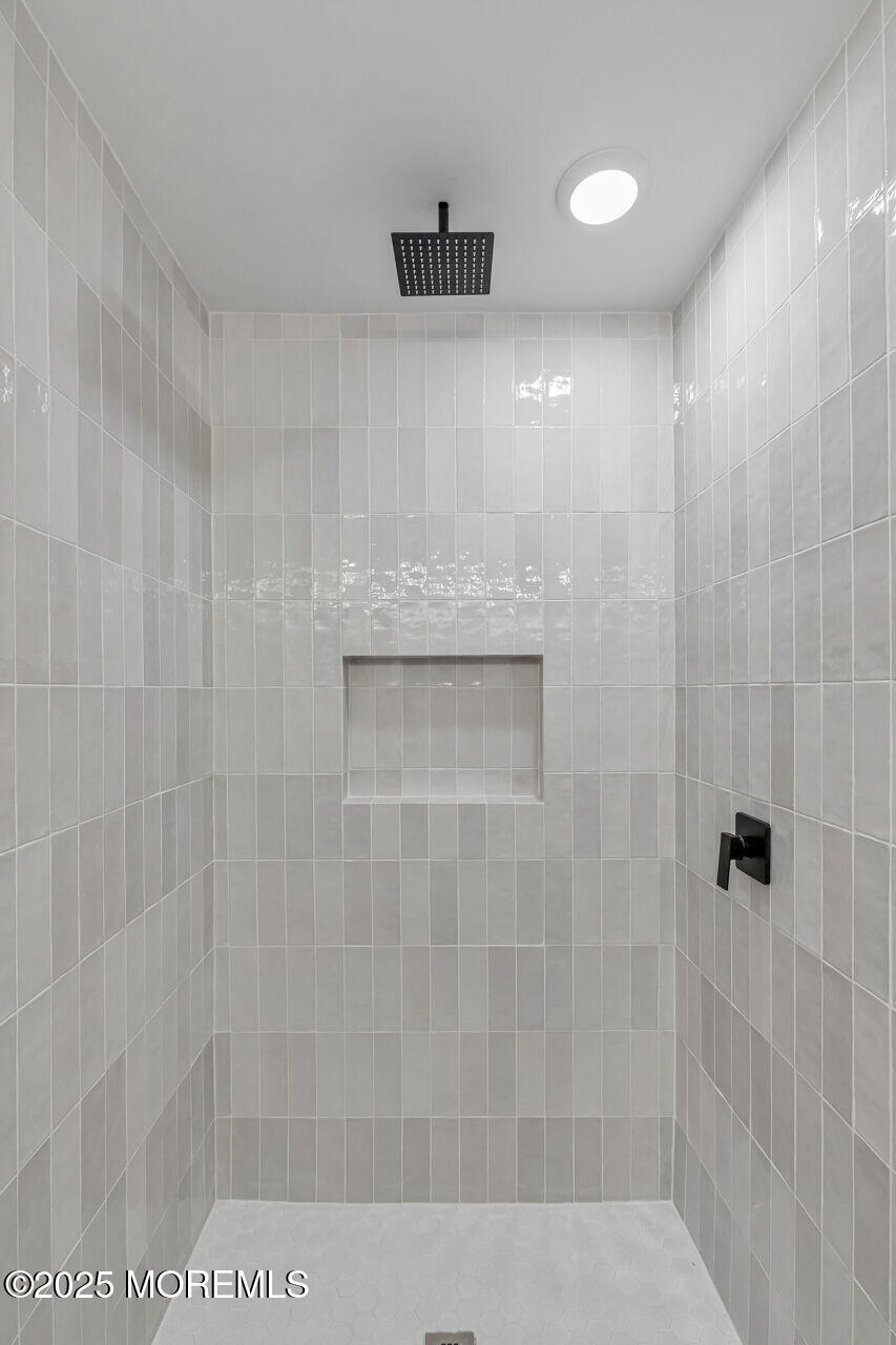 138 Stephan Road Brick, NJ 08724 - Photo 22 of 38 a bathroom with a shower