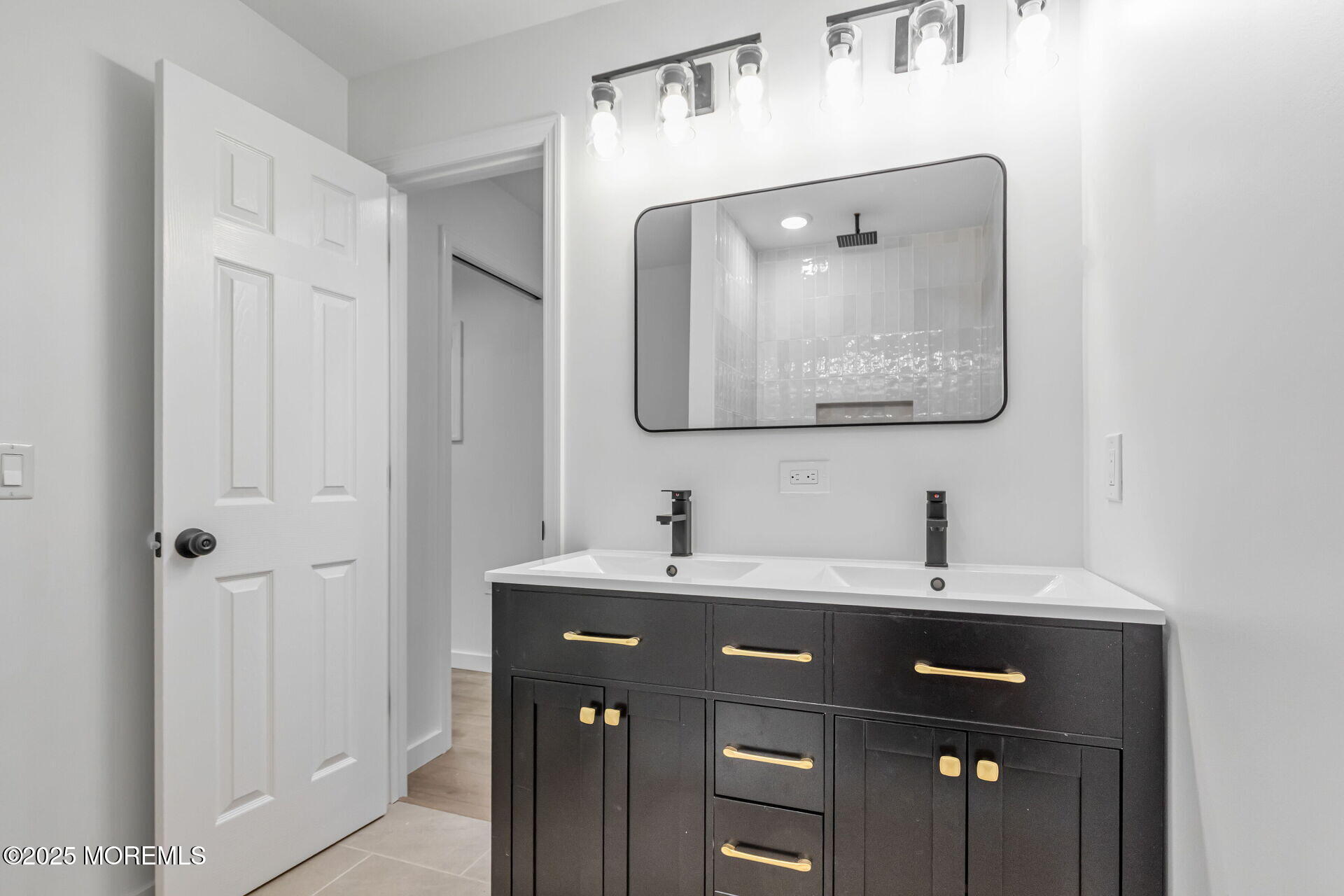 138 Stephan Road Brick, NJ 08724 - Photo 23 of 38 a bathroom with a sink vanity and a mirror
