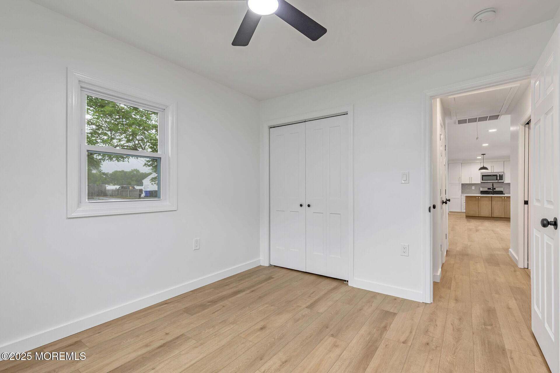 138 Stephan Road Brick, NJ 08724 - Photo 29 of 38 wooden floor in an empty room with a window