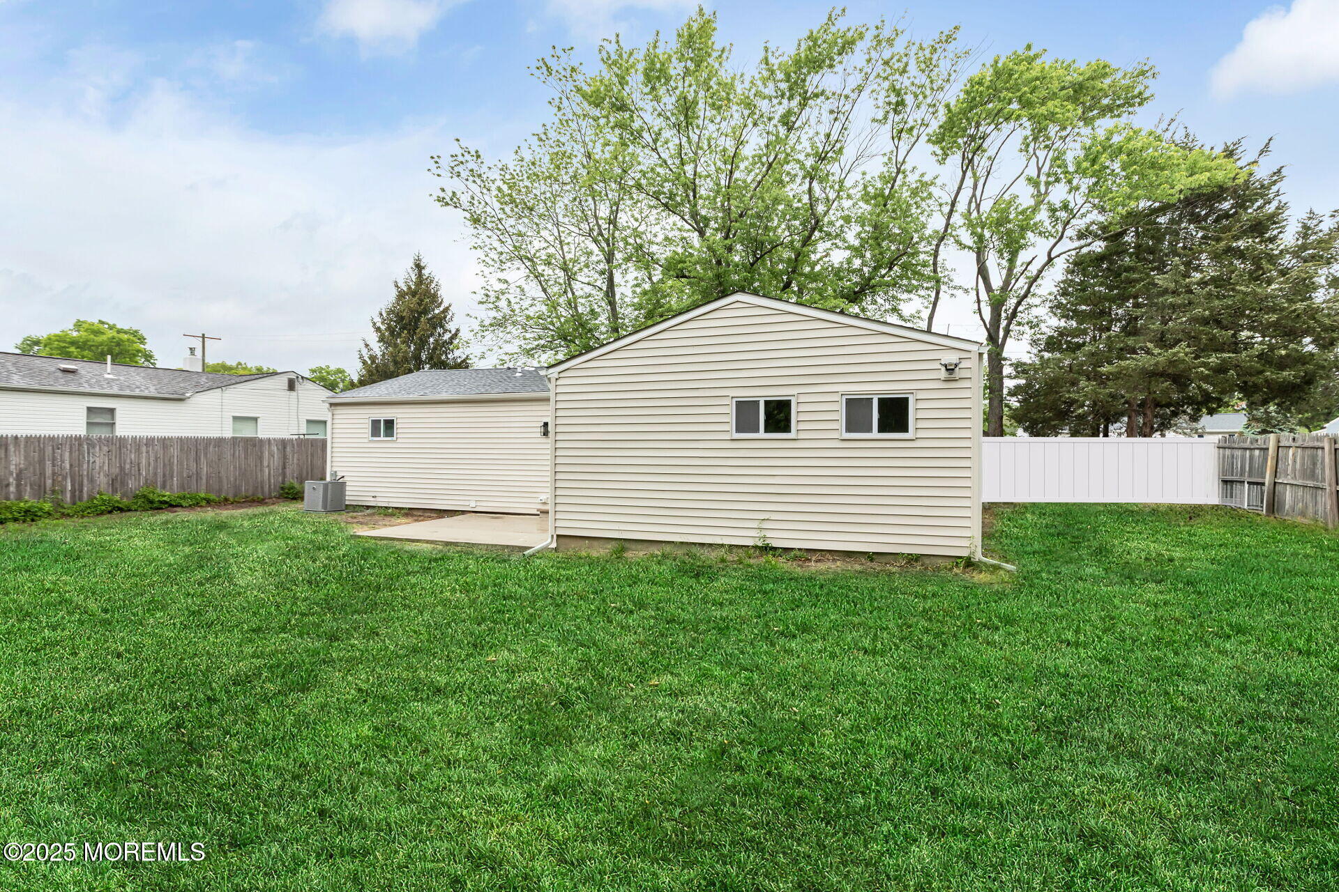 138 Stephan Road Brick, NJ 08724 - Photo 36 of 38 a view of a backyard with a garden