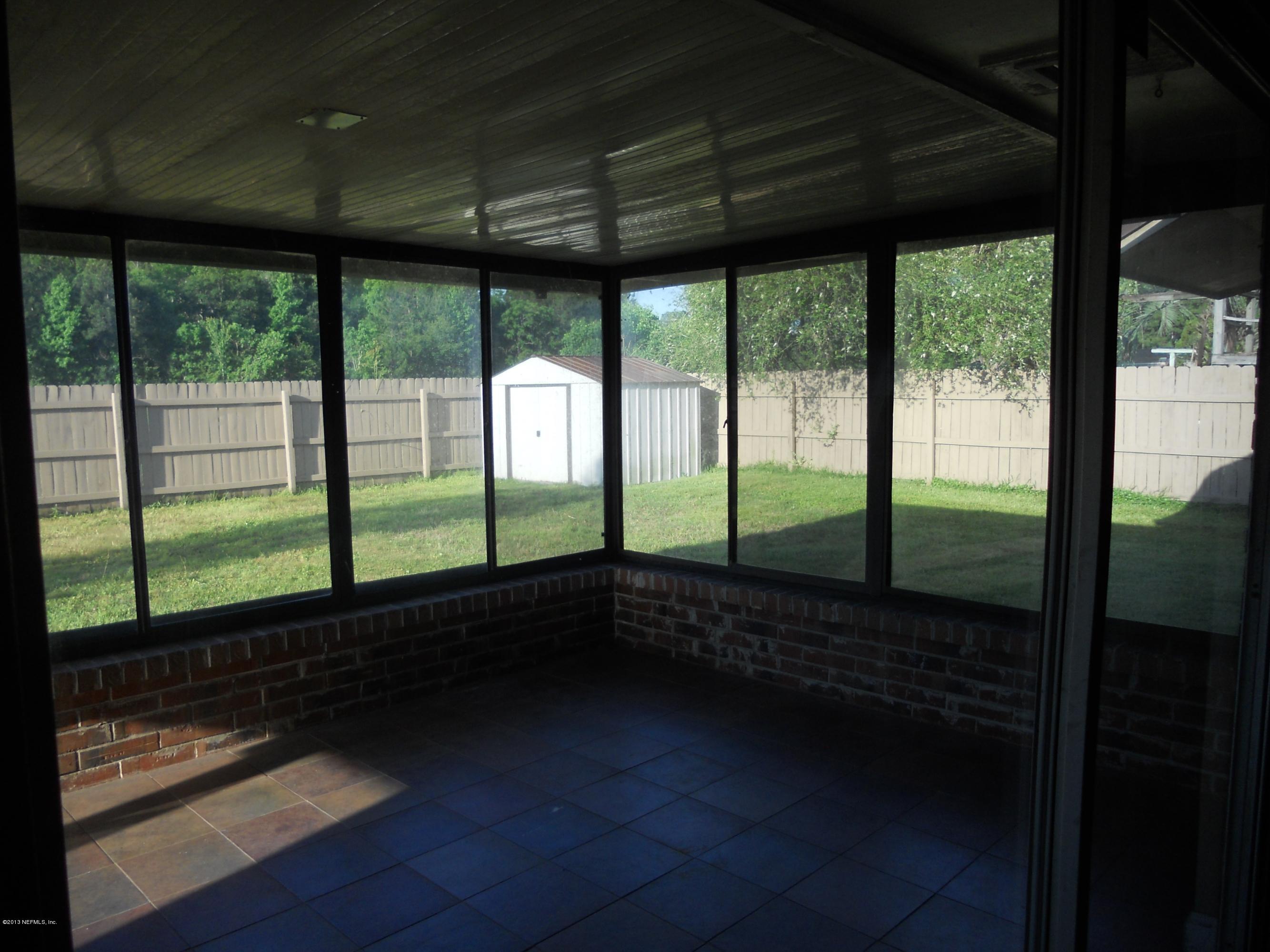 6262 Townsend Road Jacksonville, FL 32244 - Photo 19 of 34 back patio enclosure